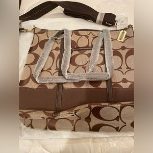 Brown “Coach” bag. Never been used. With tags. 16x14 inches.